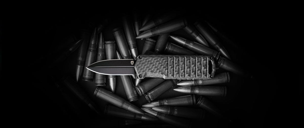 TEKTO A2 Badger mini automatic OTF knife with a carbon fiber handle