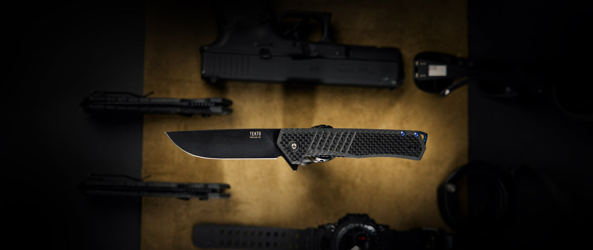 TEKTO F1 Alpha folding knife with a carbon fiber handle