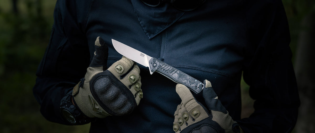 F1 Alpha folding knife from TEKTO Knives on a dark background