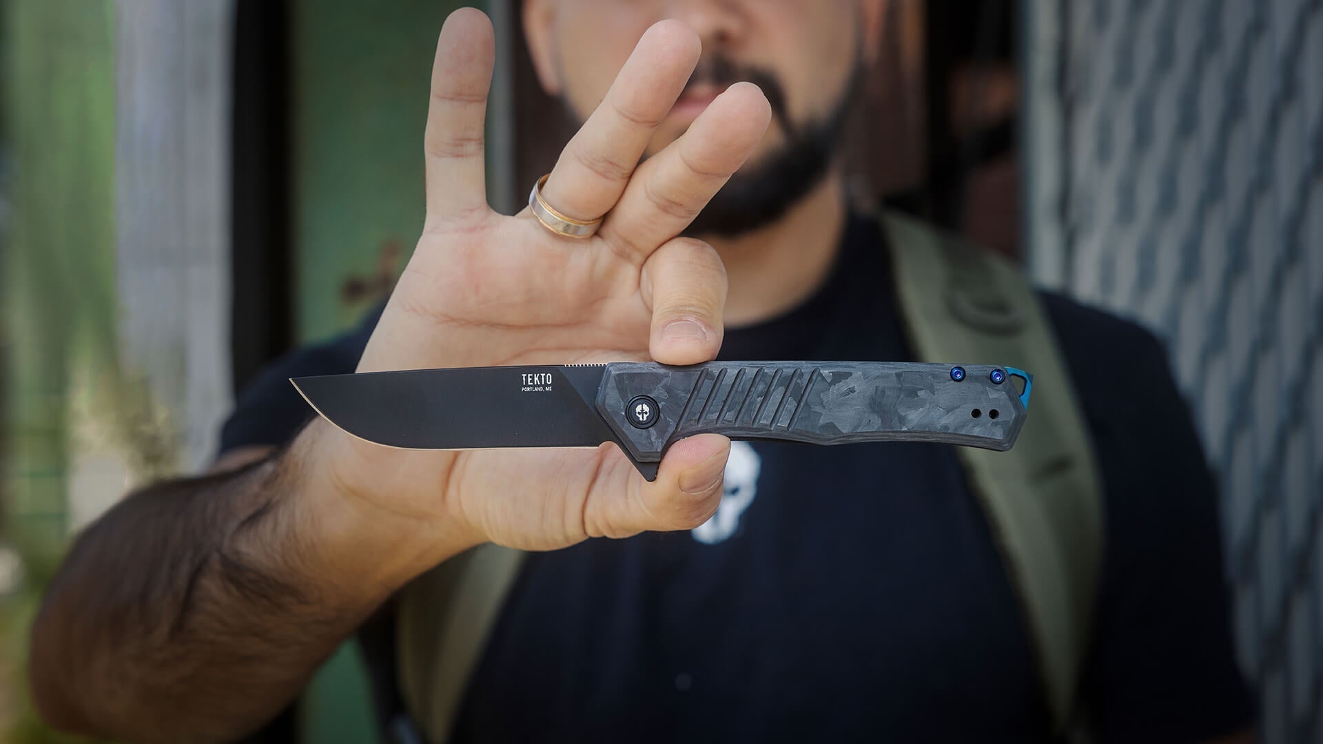 TEKTO F1 Alpha folding knife held in hand