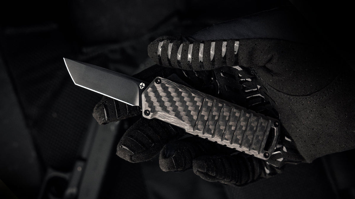 Automatic OTF Knife A2 Badger Carbon Fiber in Gloved Hand Tekto Knives