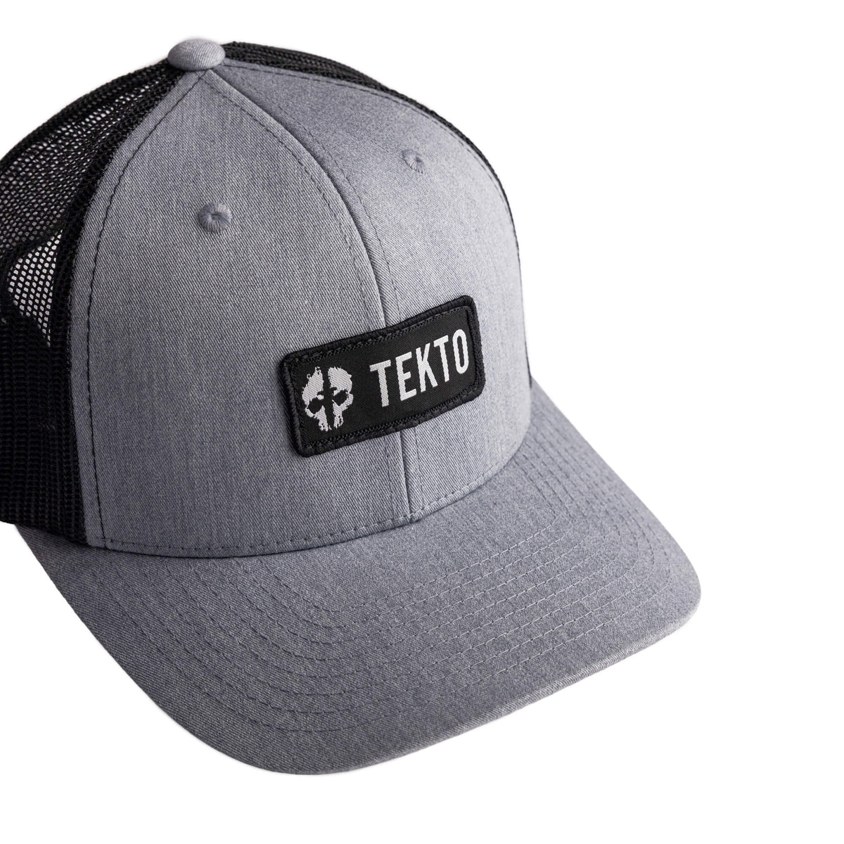 tekto gray snapback with embroidered tekto patch front view